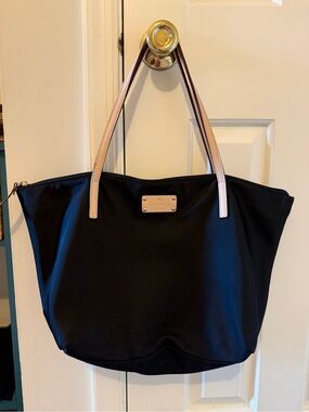 Kate Spade Black tote/ pink inside